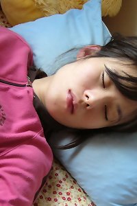 an korean couple porking on the bed while a lady is getting her hooters licked
